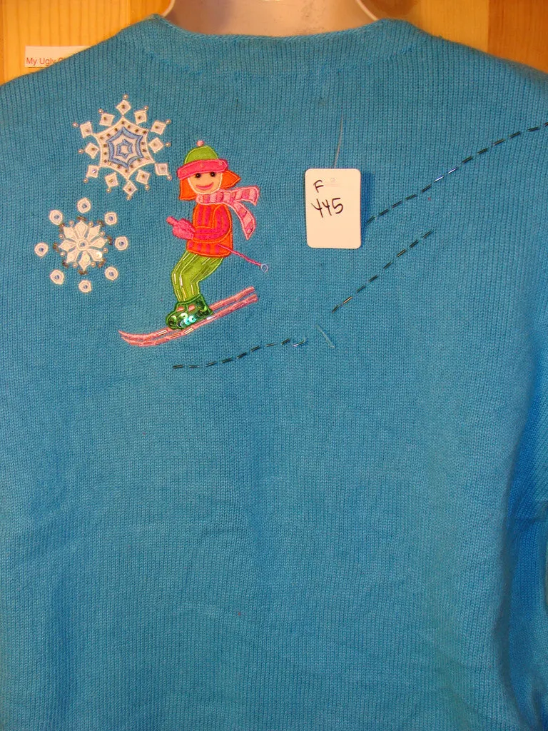 Tacky Ugly Christmas Sweater with Festive Blue Winter Wonderland with Snowflakes and Skiers on Front and Back (f445)